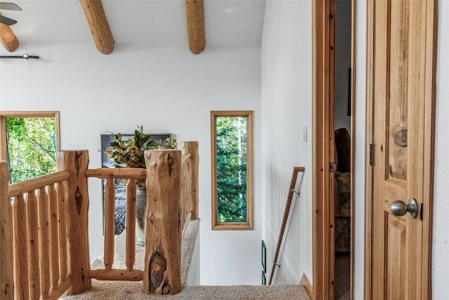 1996 Al Gulch Rd, Jefferson, CO 80456 - staircase featuring beamed ceiling and healthy amount of natural light