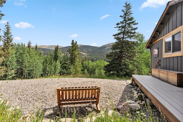 932 Peterson Dr, Alma, CO 80420 - view of yard featuring a view of trees and a deck with mountain view