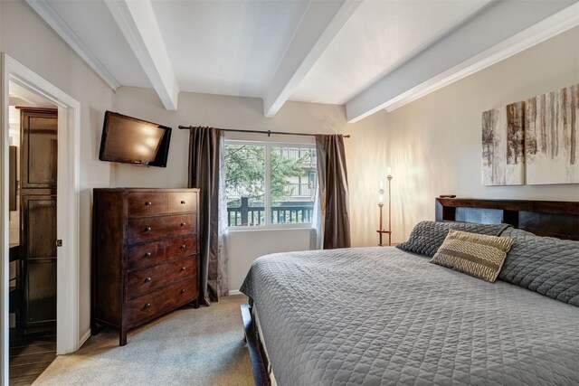 9359 State Highway 9 Unit G5, Breckenridge, CO 80424 - bedroom with beam ceiling and carpet