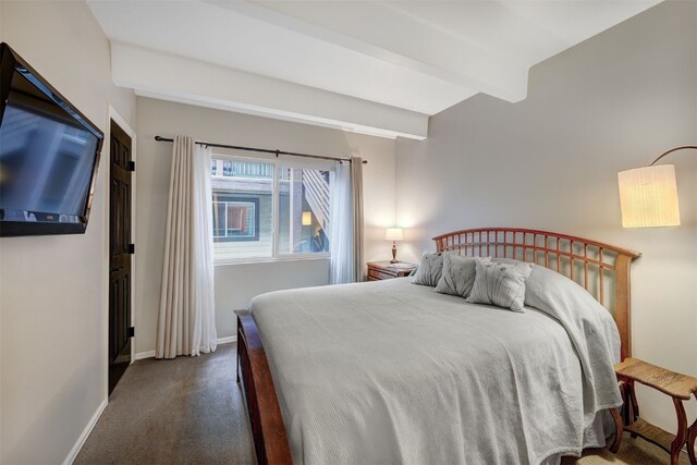 9359 State Highway 9 Unit G5, Breckenridge, CO 80424 - carpeted bedroom with beamed ceiling and baseboards