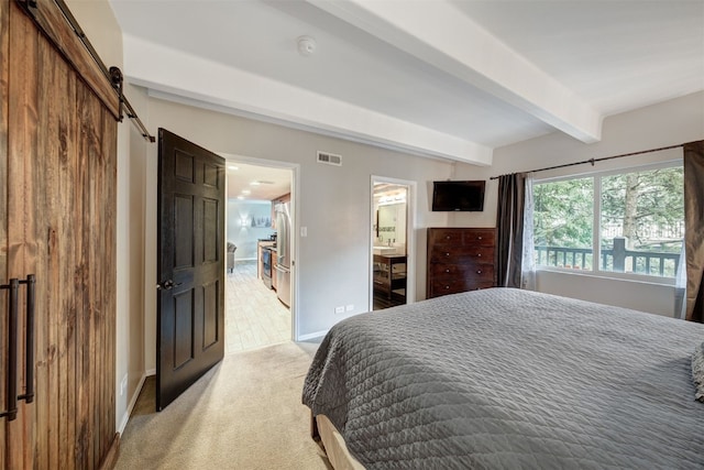 9359 State Highway 9 Unit G5, Breckenridge, CO 80424 - bedroom featuring a barn door, light carpet, beamed ceiling, stainless steel fridge, and baseboards