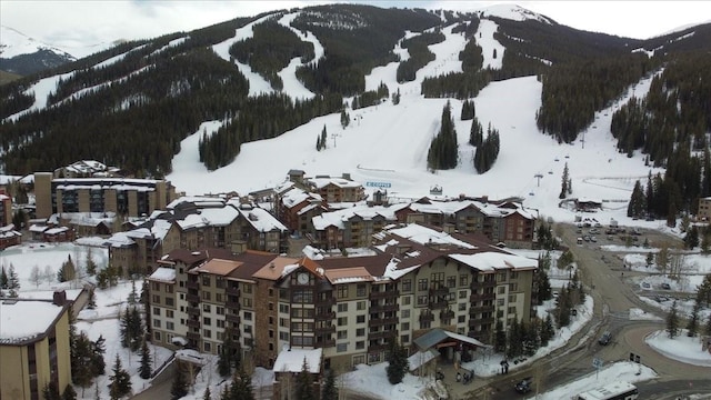 910 Copper Rd Unit 105, Frisco, CO 80443 - snowy aerial view featuring a mountain view