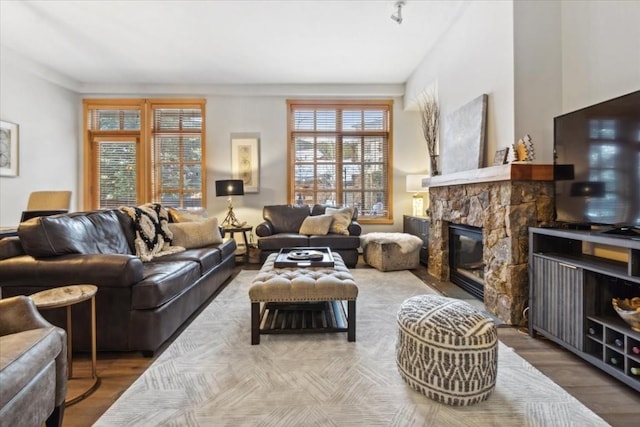 910 Copper Rd Unit 105, Frisco, CO 80443 - living room featuring a stone fireplace