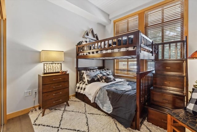 910 Copper Rd Unit 105, Frisco, CO 80443 - bedroom featuring wood finished floors and baseboards