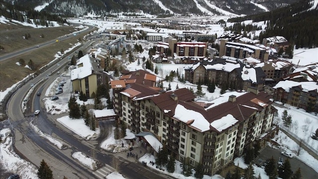 910 Copper Rd Unit 105, Frisco, CO 80443 - snowy aerial view featuring a mountain view