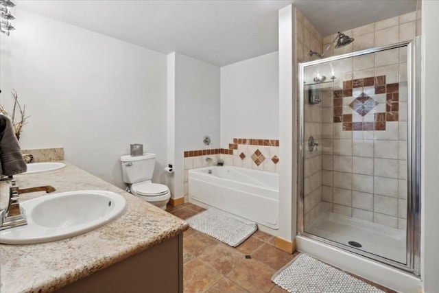 910 Copper Rd Unit 105, Frisco, CO 80443 - bathroom with tile patterned flooring, a bath, a stall shower, and double vanity