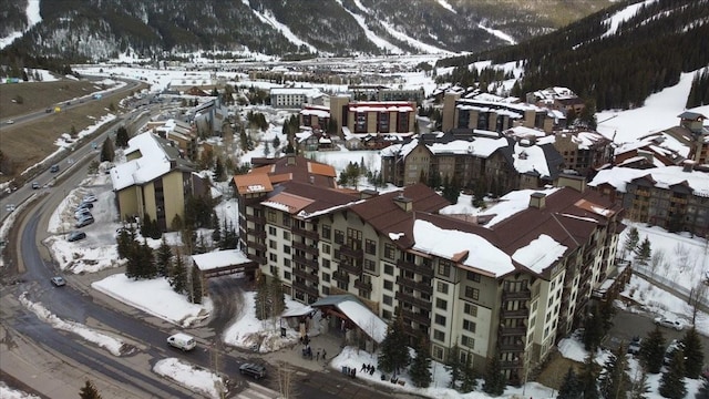 910 Copper Rd Unit 105, Frisco, CO 80443 - snowy aerial view featuring a mountain view