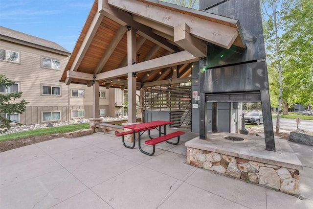 1565 Shadow Run Frontage Unit 104, Steamboat Springs, CO 80487 - view of patio with an outdoor fire pit