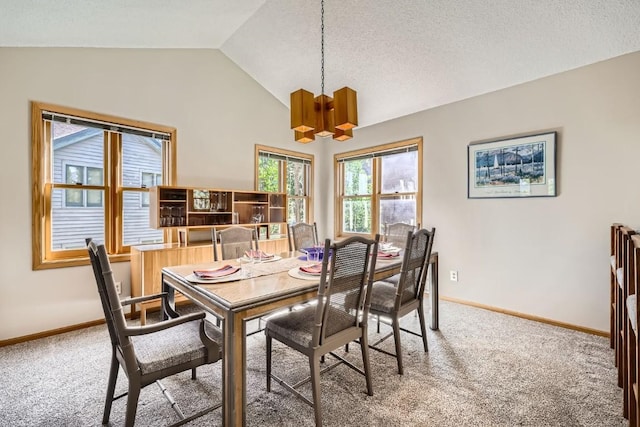 1116 Baldy Rd Unit 1116, Breckenridge, CO 80424 - dining room featuring light carpet, a chandelier, and vaulted ceiling