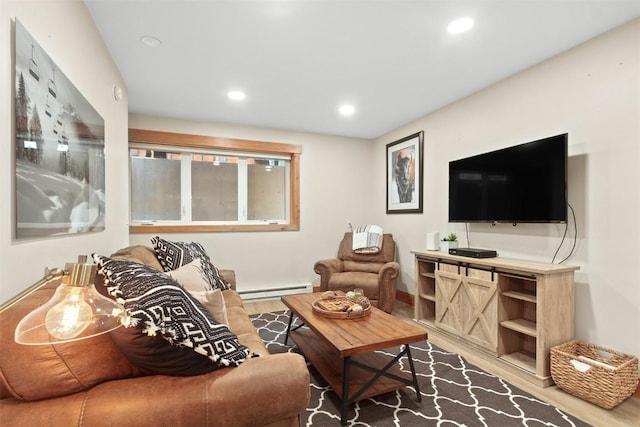 living room with recessed lighting, wood finished floors, baseboards, and baseboard heating