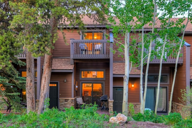 300 Primrose Path Unit 37, Breckenridge, CO 80424 - rear view of property with a balcony and stone siding