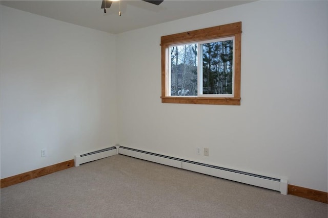 602 Ryan Gulch Rd Unit B, Silverthorne, CO 80498 - carpeted empty room featuring a baseboard heating unit and ceiling fan