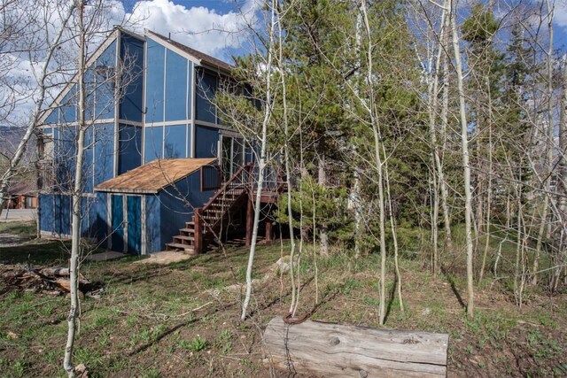 602 Ryan Gulch Rd Unit B, Silverthorne, CO 80498 - back of house featuring stairway