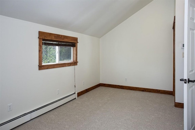 602 Ryan Gulch Rd Unit B, Silverthorne, CO 80498 - carpeted empty room featuring a baseboard radiator, lofted ceiling, and baseboards
