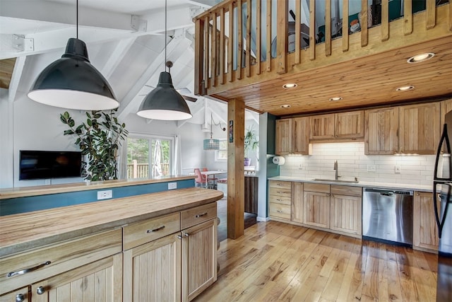 73 Illinois Gulch Rd Unit 8, Breckenridge, CO 80424 - kitchen featuring dishwasher, wood counters, backsplash, light wood-type flooring, and hanging light fixtures
