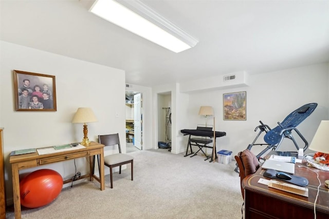 carpeted office space featuring visible vents
