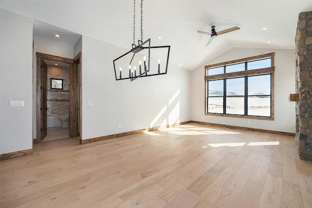 unfurnished dining area featuring light wood finished floors, lofted ceiling, a ceiling fan, and baseboards