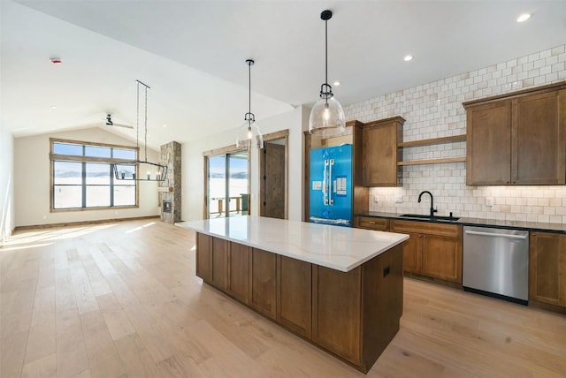 kitchen featuring a center island, stainless steel dishwasher, a sink, light wood-type flooring, and open shelves