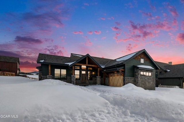 view of front of home featuring stone siding
