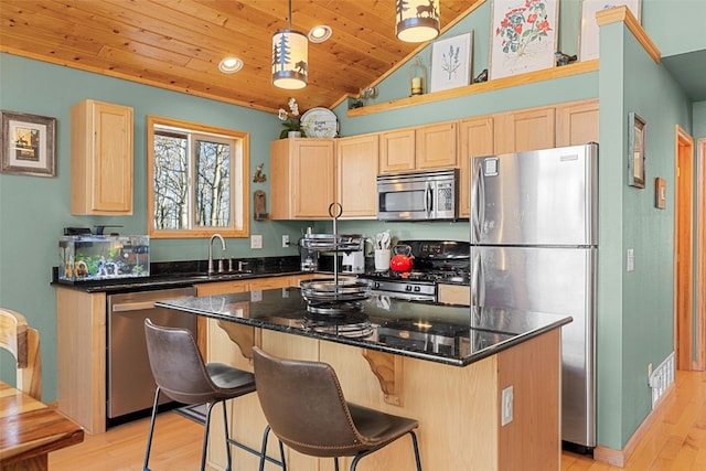 kitchen with wood ceiling, appliances with stainless steel finishes, light brown cabinets, and a sink