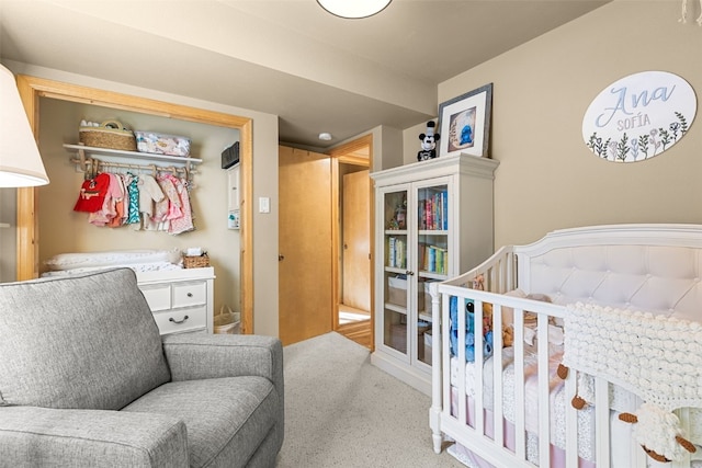 bedroom featuring a closet and carpet