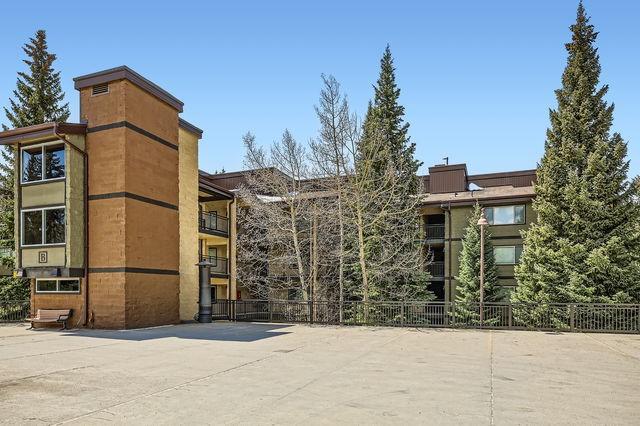 755 Columbine Rd Unit 303, Breckenridge, CO 80424 - view of building exterior featuring fence
