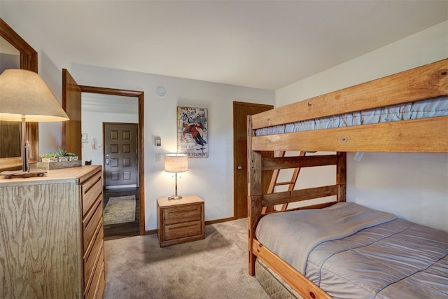 23034 US Highway 6 Unit 203, Dillon, CO 80435 - bedroom with light carpet and baseboards