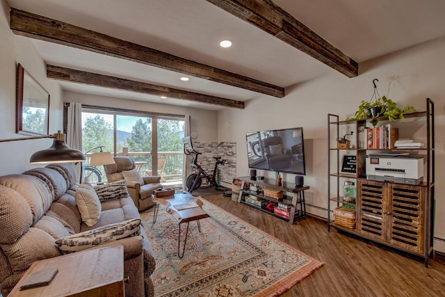 2442 Ryan Gulch Ct Unit 204, Silverthorne, CO 80498 - living room with wood finished floors, beam ceiling, and recessed lighting