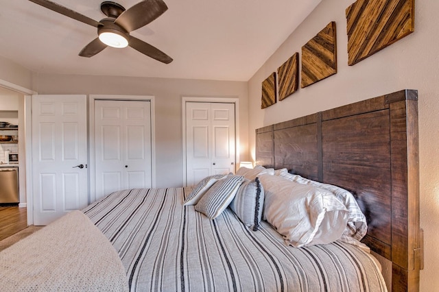 2442 Ryan Gulch Ct Unit 204, Silverthorne, CO 80498 - bedroom featuring two closets and ceiling fan