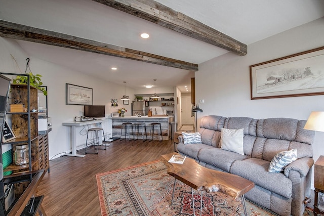 2442 Ryan Gulch Ct Unit 204, Silverthorne, CO 80498 - living area with beam ceiling, wood finished floors, and recessed lighting
