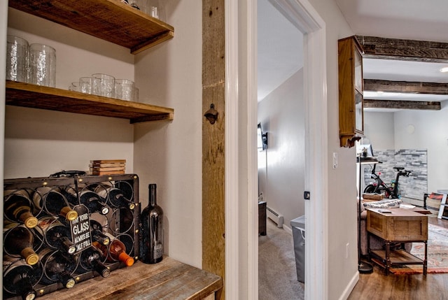 2442 Ryan Gulch Ct Unit 204, Silverthorne, CO 80498 - wine room featuring baseboard heating and wood finished floors
