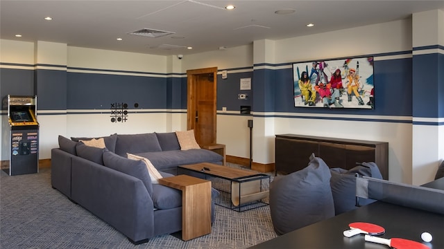 living area with recessed lighting, visible vents, and carpet flooring