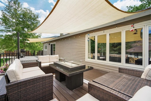 897 Deer Path Rd, Dillon, CO 80435 - deck featuring an outdoor living space with a fire pit
