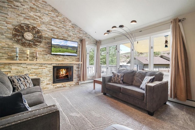 897 Deer Path Rd, Dillon, CO 80435 - living room with carpet floors, a glass covered fireplace, and high vaulted ceiling