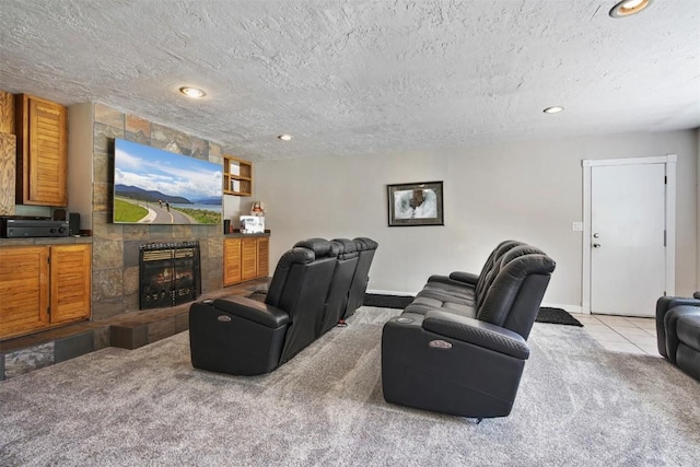 897 Deer Path Rd, Dillon, CO 80435 - home theater with a fireplace, carpet flooring, a textured ceiling, recessed lighting, and baseboards
