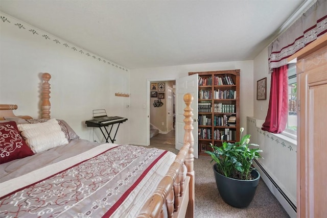 897 Deer Path Rd, Dillon, CO 80435 - carpeted bedroom featuring baseboard heating