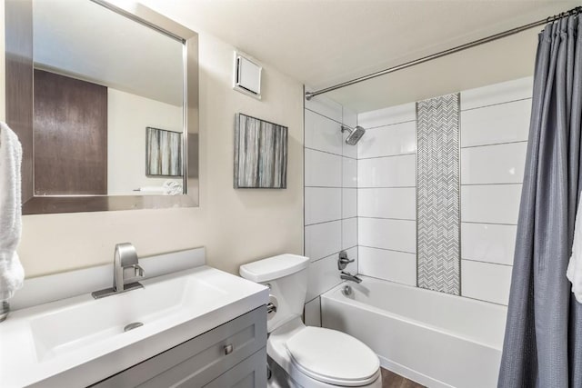 2200 Lodgepole Cir Unit 308, Silverthorne, CO 80498 - bathroom featuring toilet, shower / bath combo with shower curtain, and vanity