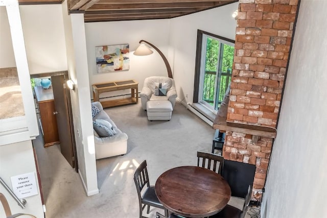 2200 Lodgepole Cir Unit 308, Silverthorne, CO 80498 - living area with a baseboard heating unit and carpet
