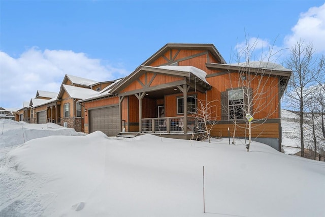 view of front of home featuring a garage and covered porch