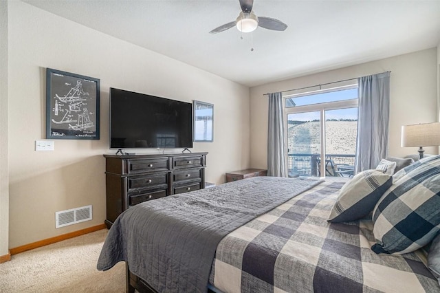 carpeted bedroom with access to outside and ceiling fan