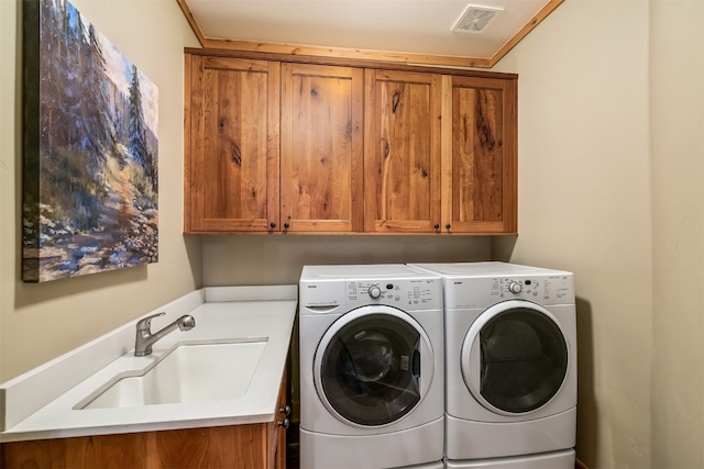 2655 Hunters Knob Rd, Silverthorne, CO 80498 - laundry room with washing machine and dryer and cabinet space