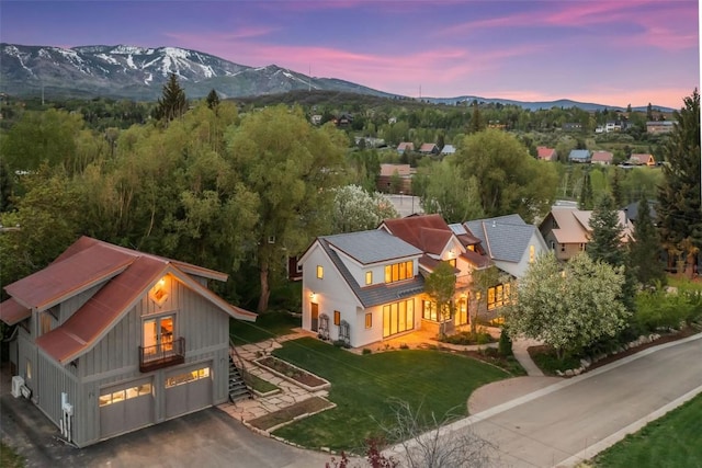 24 Maple St, Steamboat Springs, CO 80487 - aerial view of property and surrounding area with a mountainous background