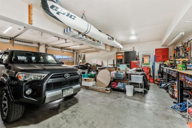 24 Maple St, Steamboat Springs, CO 80487 - garage featuring a workshop area