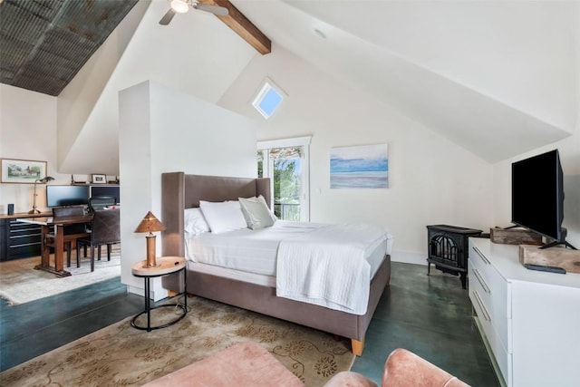 24 Maple St, Steamboat Springs, CO 80487 - bedroom featuring finished concrete flooring, beam ceiling, a wood stove, a desk, and high vaulted ceiling