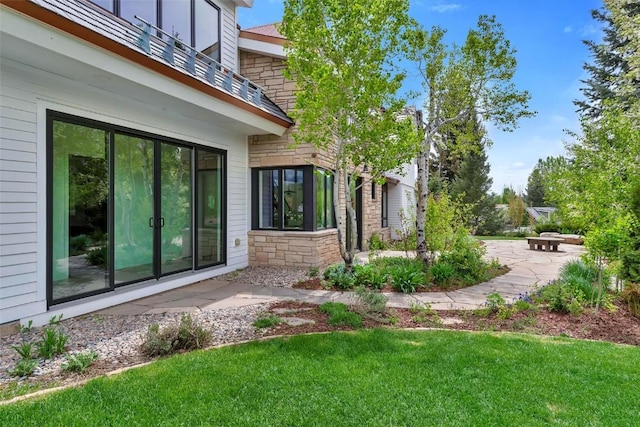 24 Maple St, Steamboat Springs, CO 80487 - view of grassy yard with a patio