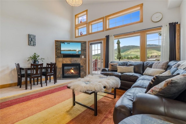 135 Main St Unit 202, Dillon, CO 80435 - living area with a towering ceiling and a glass covered fireplace