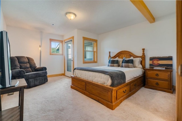 135 Main St Unit 202, Dillon, CO 80435 - bedroom with light carpet and beam ceiling