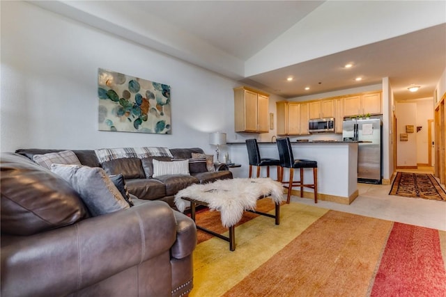 135 Main St Unit 202, Dillon, CO 80435 - living room featuring vaulted ceiling and recessed lighting