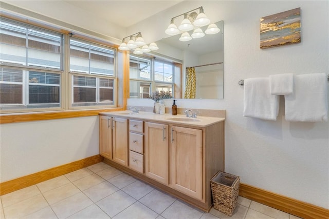 135 Main St Unit 202, Dillon, CO 80435 - bathroom featuring double vanity, tile patterned floors, and a shower with shower curtain