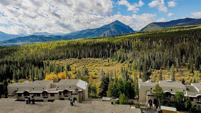 mountain view featuring a view of trees